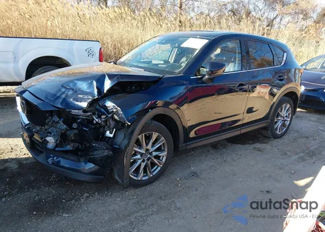 2021 Mazda Cx-5 Grand Touring z USA, uszkodzony, nr VIN JM3KFBDM4M0410667